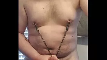 Play Fatty rubbing his cock playing with nipple clamps